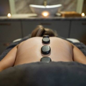 Hot stone back massage the springs wellness suites  custom cms-county-arms-hotel
